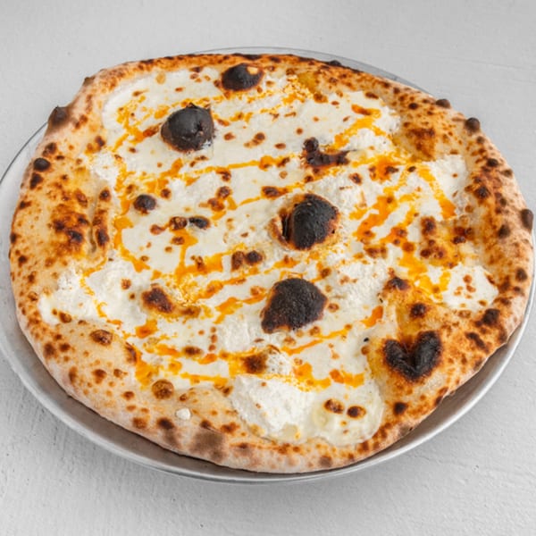 How Ya Dough'n Pizza's white pizza with ricotta, mozzarella, and a drizzle of orange oil.